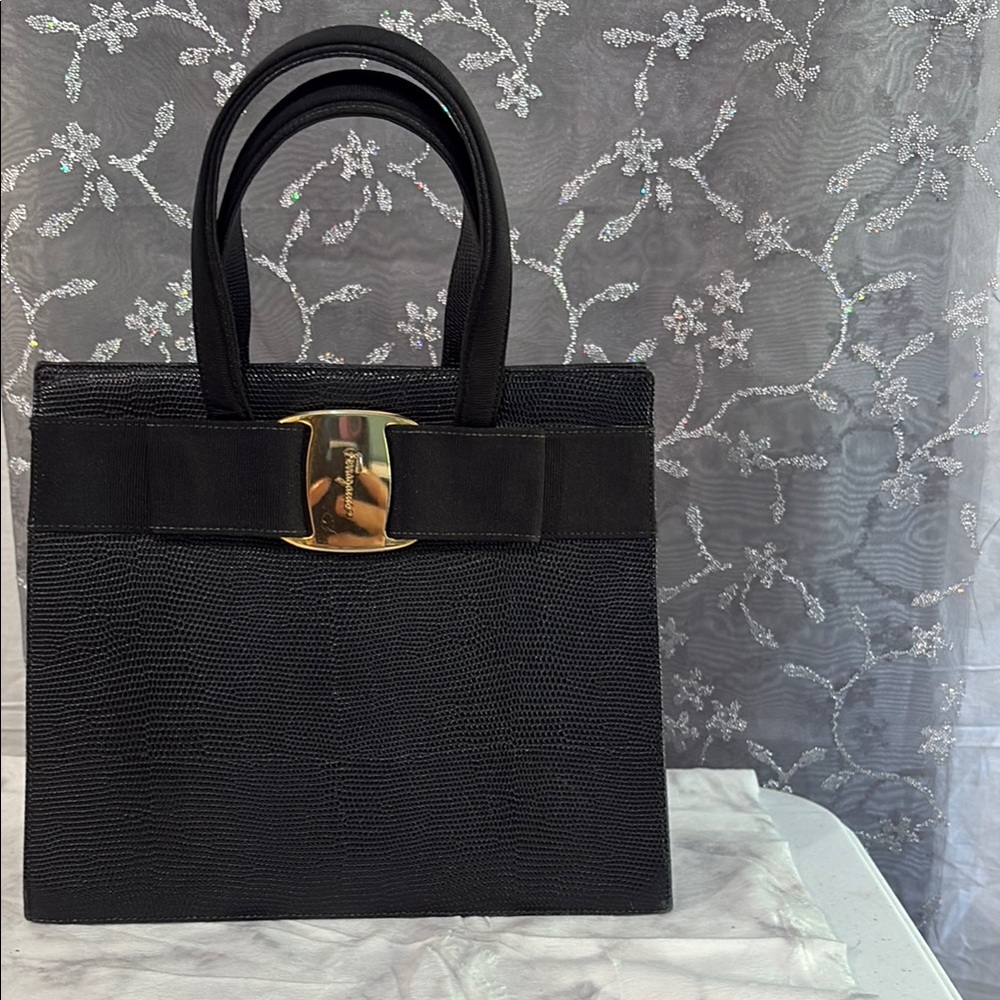 Salvatore Ferragamo Black and Gold Tote Bag with Structured Design